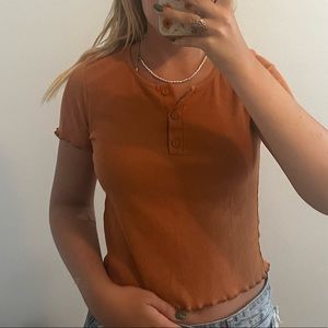 Orange short sleeve cropped shirt